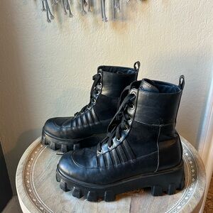 Euphoria Black Leather Boots from iheartraves